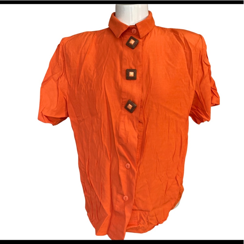 Vintage Orange blouse with shoulder pads.